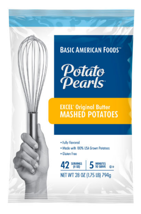 A box of Basic American Foods Potato Pearls® EXCEL® Original Butter Mashed Potatoes, featuring a hand holding a spatula, product details on the front.